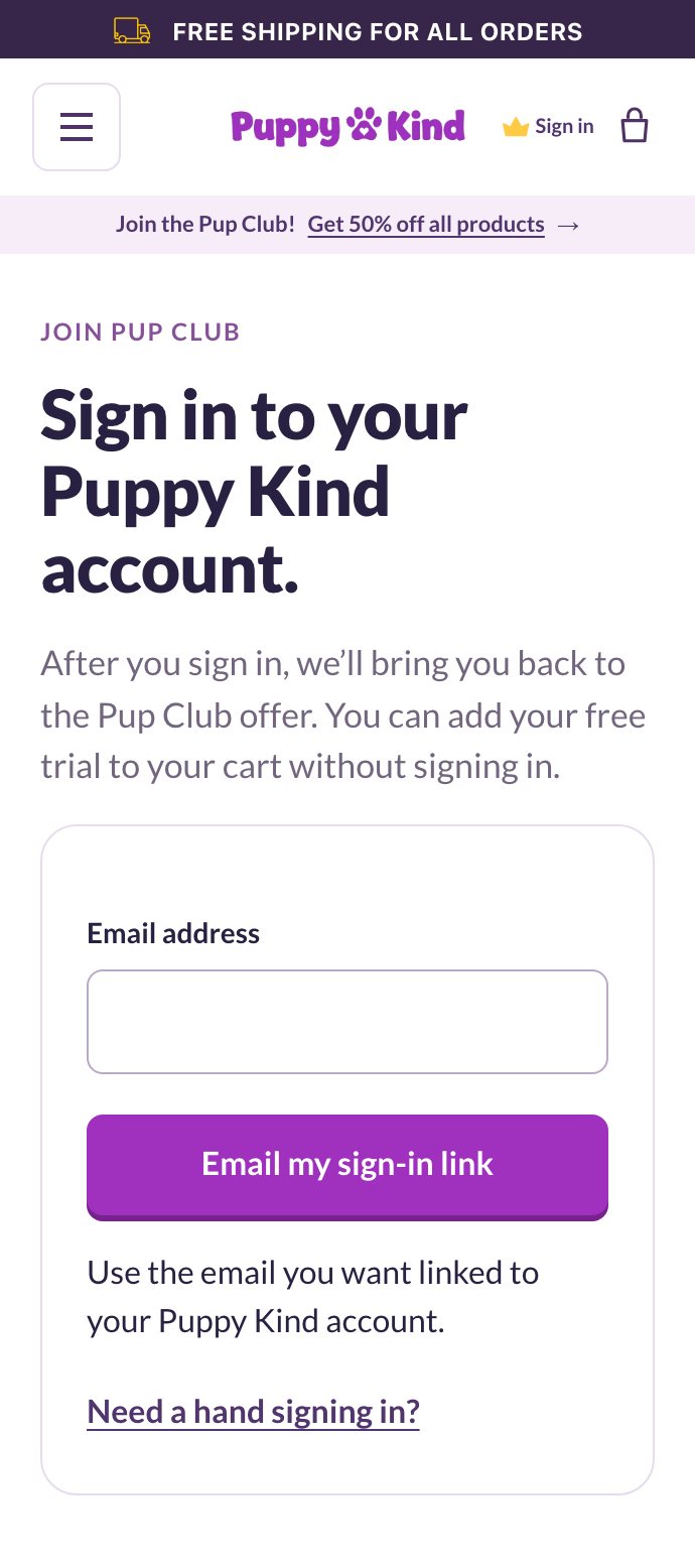 Screenshot of Puppy Kind's account sign-in page on a phone, with an email field and an Email my sign-in link button.